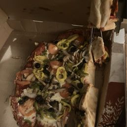Veggie pizza after delivery Veggie pizza after delivery