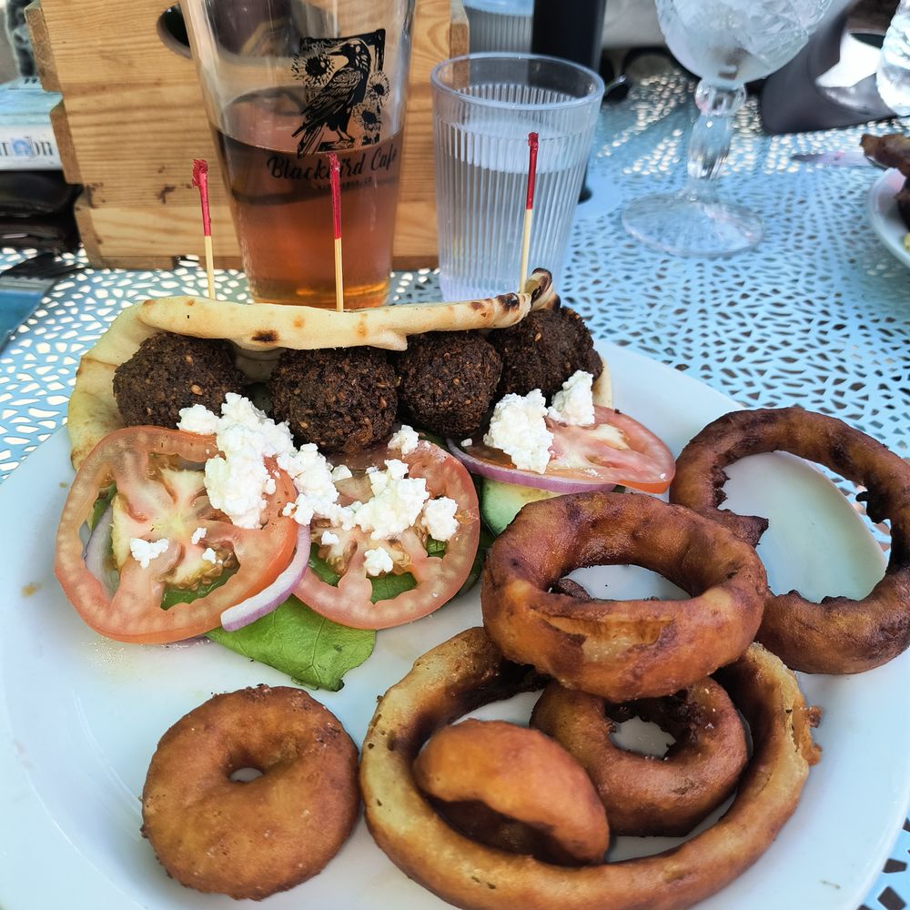 My falafel, onion rings and beer. My falafel, onion rings and beer.