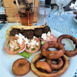 My falafel, onion rings and beer. My falafel, onion rings and beer.
