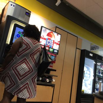 DGX Raleigh - a woman standing in front of a vending machine - Convenience Stores Near Me - Raleigh, North Carolina DGX Raleigh - a woman standing in front of a vending machine - Convenience Stores Near Me - Raleigh, North Carolina