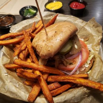 Freakin' Unbelievable Burgers - Impossible burger on gluten free bun (vegan) and sweet potato fries - Burgers Near Me - Flint, Michigan