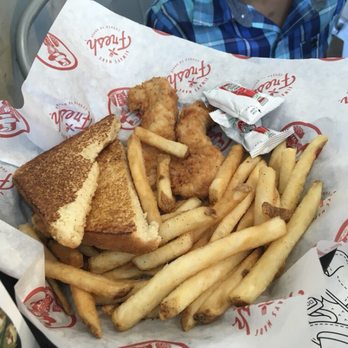 Slim Chickens - Kids meal with 2 chicken tenders, fries, and Texas toast. Wasn't too pleased with the toast. - Chicken Wings Near Me - Plainfield, Illinois