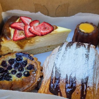 Ocean Side Bakery - Pan Au Chocolat, lilikoi canele, German Cheesecake, and blueberry custard tart - Bakeries Near Me - Honolulu, Hawaii