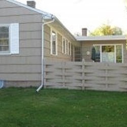 DeWolff Painting & Repair - Painted fence to match house