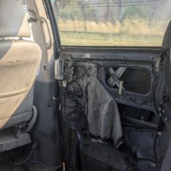 Speedy Transportation - This is the state of their vehicles! Door was so beat up that it flew open WHILE DRIVING with kids in the car! They need to be shut down!!