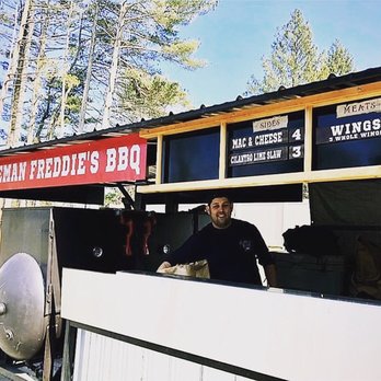 Fireman Freddie’s BBQ - a man behind the grill - Food Trucks Near Me Fireman Freddie’s BBQ - a man behind the grill - Food Trucks Near Me