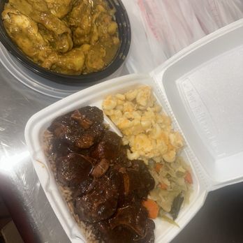 DJ's Caribbean Kitchen - Everything tastes great. Curry Chicken Oxtails Chef's kiss every time. - Caribbean Near Me - College Park, Georgia
