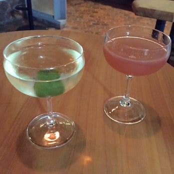 The Progress - Cocktails before dinner, martini with rosemary oil is on the left - New American Near Me - San Francisco, California The Progress - Cocktails before dinner, martini with rosemary oil is on the left - New American Near Me - San Francisco, California
