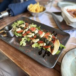 Le Bistro - Burrata cheese salad with olive oil and balsamic glaze