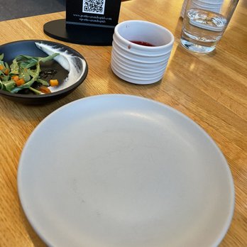 Portico - Not sure why I included the empty plate, but these are the tiny, delicious apertifs - New American Near Me - Grand Rapids, Michigan