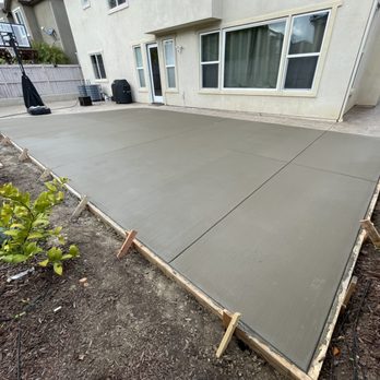 Coastal Landscape - Concrete extension - Tree Services Near Me
