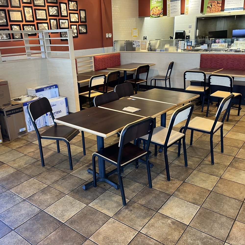QDOBA Mexican Eats - tables and chairs in a restaurant - Mexican Near Me - New Albany, Indiana QDOBA Mexican Eats - tables and chairs in a restaurant - Mexican Near Me - New Albany, Indiana