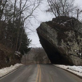 Clear Creek Metro Park - Overhanging massive natural rock cut on road. - Parks Near Me - Rockbridge, Ohio Clear Creek Metro Park - Overhanging massive natural rock cut on road. - Parks Near Me - Rockbridge, Ohio