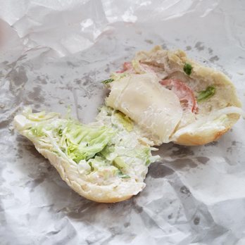 Cousins Subs - a half eaten sub sandwich - Sandwiches Near Me - Sussex, Wisconsin Cousins Subs - a half eaten sub sandwich - Sandwiches Near Me - Sussex, Wisconsin