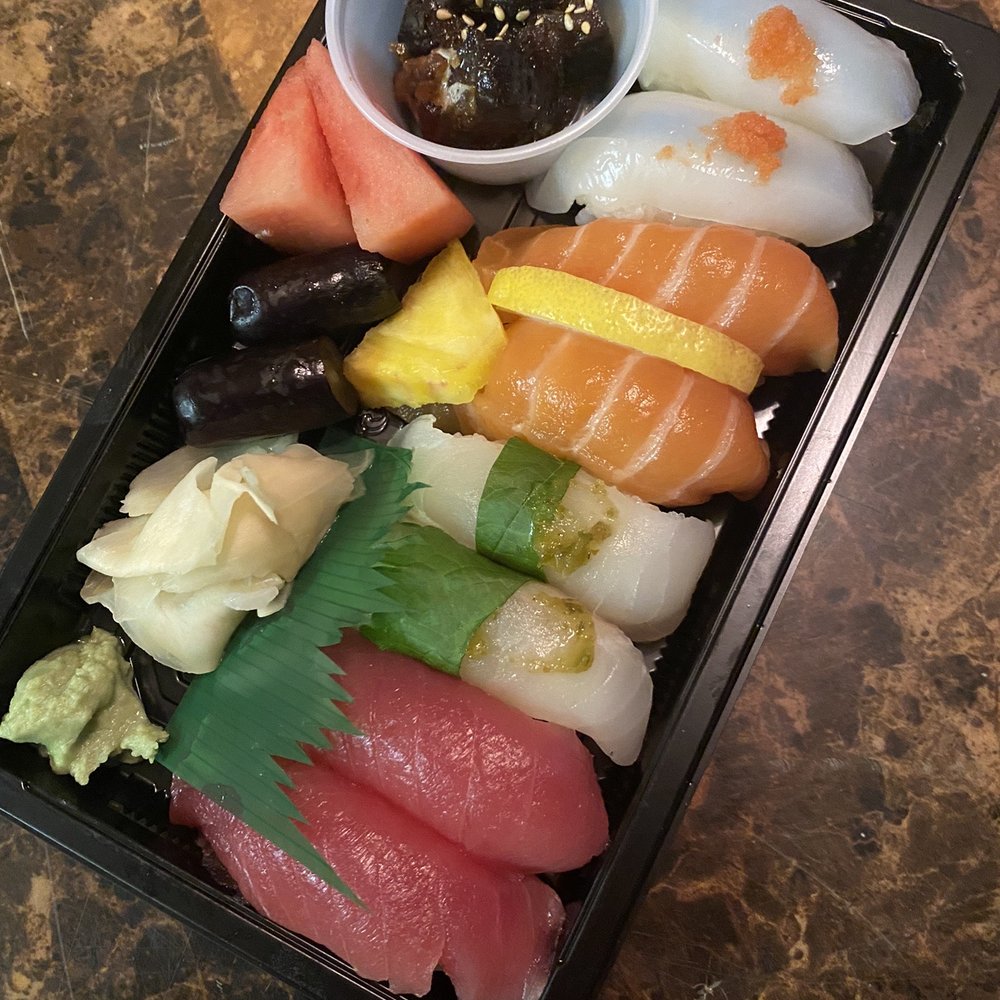 Yamato - Tuna, Flounder, Salmon, and Squid nigiri (from left to right) - Japanese Near Me - Tucson, Arizona Yamato - Tuna, Flounder, Salmon, and Squid nigiri (from left to right) - Japanese Near Me - Tucson, Arizona
