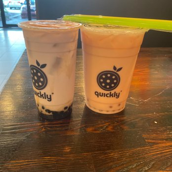 Quickly Boba Tea - Large (24oz) Taro milk tea with boba (left) and Extra large (30oz) rose milk tea with rose popping boba - Bubble Tea Near Me - Orlando, Florida Quickly Boba Tea - Large (24oz) Taro milk tea with boba (left) and Extra large (30oz) rose milk tea with rose popping boba - Bubble Tea Near Me - Orlando, Florida