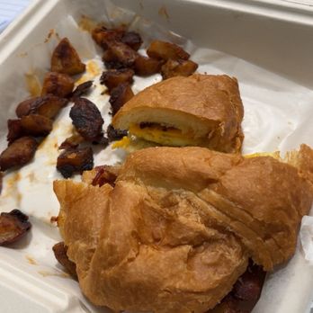Green's Pharmacy Luncheonette - Bacon egg and cheese croissant with home fries - Drugstores Near Me - Palm Beach, Florida Green's Pharmacy Luncheonette - Bacon egg and cheese croissant with home fries - Drugstores Near Me - Palm Beach, Florida