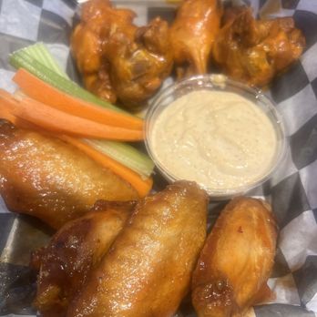Doyle's Outpost - Buffalo and Honey Sriracha Wings. - Arcades Near Me - Alexandria, Virginia