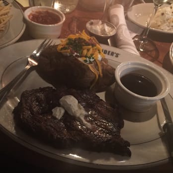 J. Alexander's - Grilled Prime rib with a load baked potato. - New American Near Me - Oak Brook, Illinois