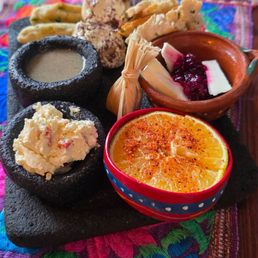 Local orange with chapulines, cheese spread, tangy salsa, home made tamales, etc etc! Local orange with chapulines, cheese spread, tangy salsa, home made tamales, etc etc!