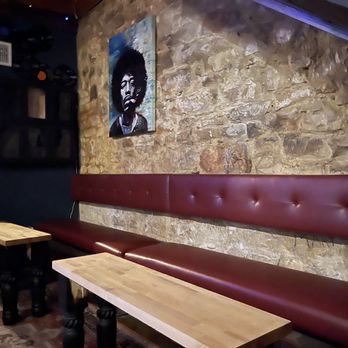 Yup Lounge - two benches and a table - Bars Near Me - Austin, Texas