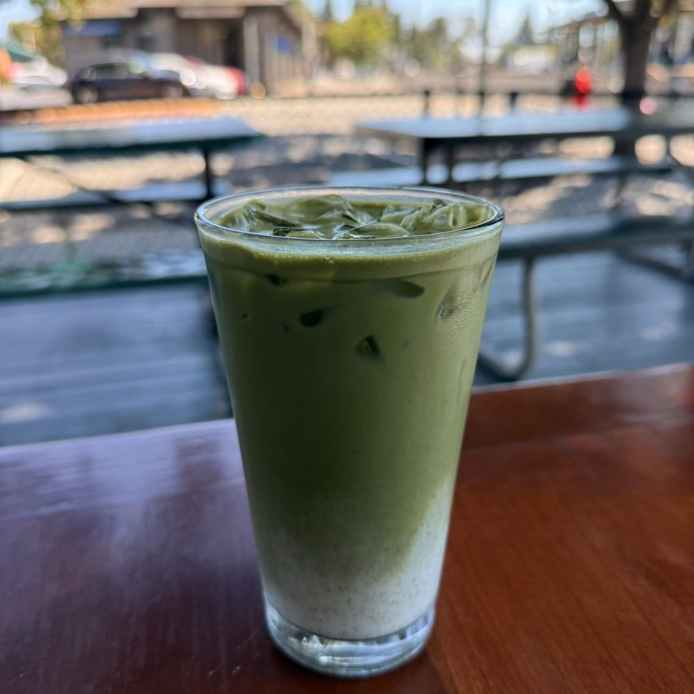 A'Roma Roasters - Matcha latte on outdoor patio - Coffee & Tea Near Me - Santa Rosa, California A'Roma Roasters - Matcha latte on outdoor patio - Coffee & Tea Near Me - Santa Rosa, California