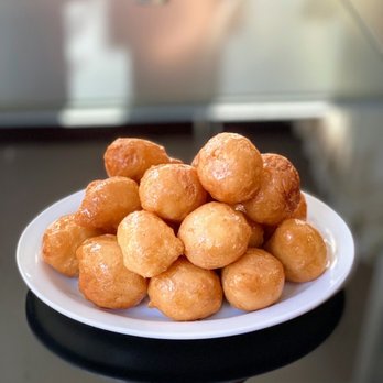 Fartun Cultural Cuisine - a plate of doughnuts - African Near Me - Edmonton, Alberta Fartun Cultural Cuisine - a plate of doughnuts - African Near Me - Edmonton, Alberta