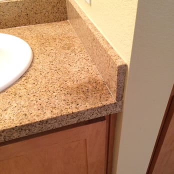 Avalon San Bruno - cheap granite counter tops with major water stains. this would be tenants fault and maintenance people never bothering to seal it. apt 400/1 - Apartments Near Me - San Bruno, California
