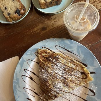 Cafe Du Soleil - Strawberry Un Peu Crepe with Chocolate Sauce with iced caramel latte - Coffee & Tea Near Me - Alexandria, Virginia Cafe Du Soleil - Strawberry Un Peu Crepe with Chocolate Sauce with iced caramel latte - Coffee & Tea Near Me - Alexandria, Virginia