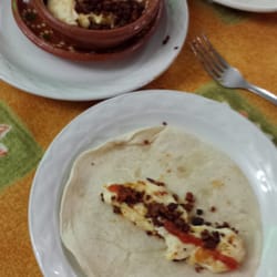 Blarritz - Cheese and chorizo.  Put into flour tortilla and enjoy!