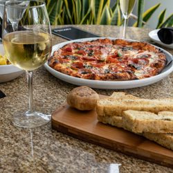 Start your dinner with our unforgettable roasted garlic & toasted focaccia