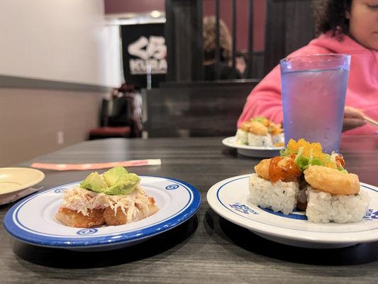 Kura Revolving Sushi Bar by null