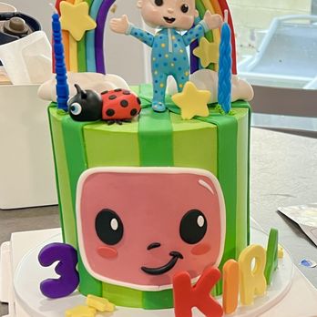 Oh Sweet Tings - Custom Cocomelon cake - strawberry cake with Nutella filling and vanilla buttercream frosting - Custom Cakes Near Me