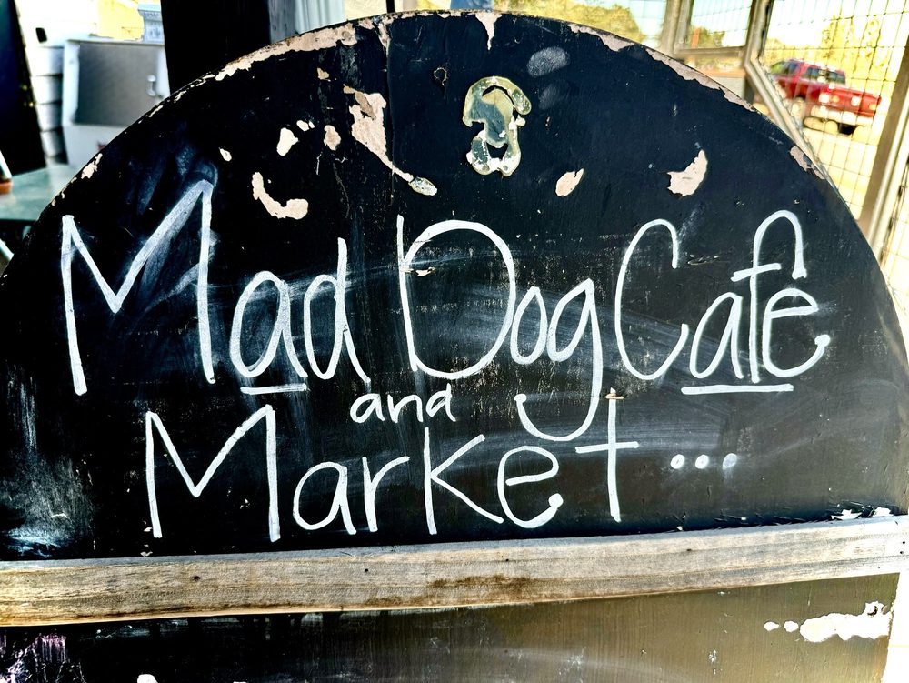 The New Woodfords Station Logo