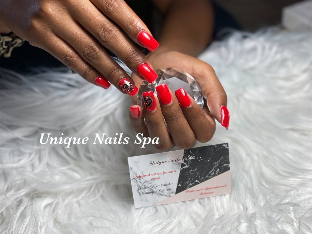 Unique Nails Spa Logo