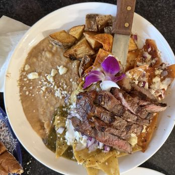 Casa Mia Bistro - Chilaquiles red and green sauce with steak - Mexican Near Me - Victorville, California Casa Mia Bistro - Chilaquiles red and green sauce with steak - Mexican Near Me - Victorville, California