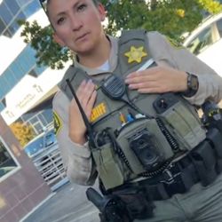 Santa Clarita Valley Sheriffs Station - Trying to cover up her name and badge number as she knew I was recording!