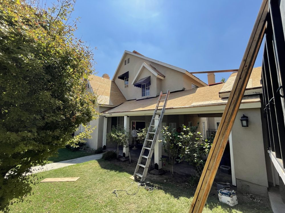 Slide of The Local Friendly Roofer