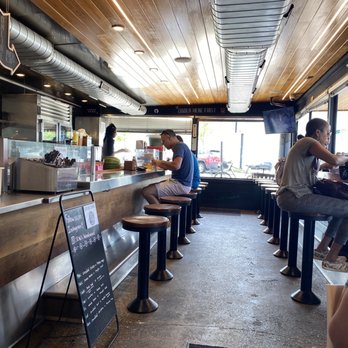 OWL - people sitting at a counter in a restaurant - Mexican Near Me - Royal Oak, Michigan OWL - people sitting at a counter in a restaurant - Mexican Near Me - Royal Oak, Michigan