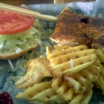 Dune Dog Cafe - This is supposed to be a blackened chicken sandwich but that's fried, not blackened. - American Near Me - Jupiter, Florida Dune Dog Cafe - This is supposed to be a blackened chicken sandwich but that's fried, not blackened. - American Near Me - Jupiter, Florida