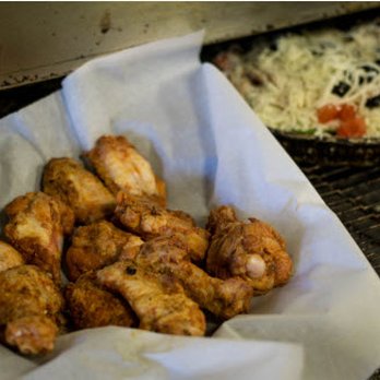 Pizza Factory - a basket of chicken wings and a pizza - Pizza Near Me - Coquitlam, British Columbia