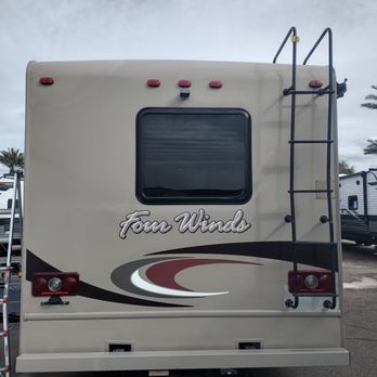 Quintessence - Final picture of the left top corner of this RV,also we coat the whole RV with a four year life span coating,the paint won't chalk of peel . - Auto Detailing Near Me Quintessence - Final picture of the left top corner of this RV,also we coat the whole RV with a four year life span coating,the paint won't chalk of peel . - Auto Detailing Near Me