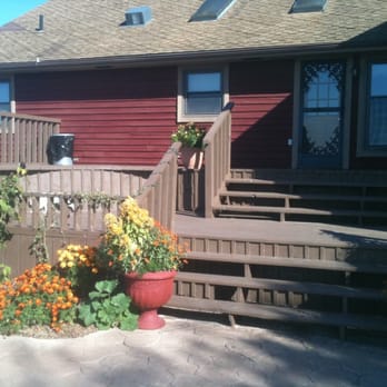 Cedar Crest Lodge - Outside deck next to dining room - Bed & Breakfast Near Me - Pleasanton, Kansas