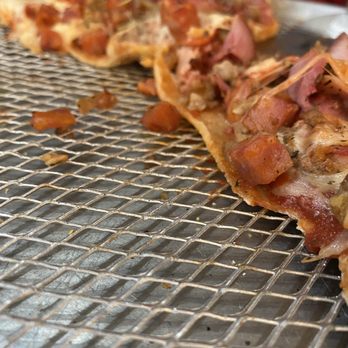 Brick Oven Pizza - Botton of the Ultimeat Pizza was way too thin - Pizza Near Me - Kapolei, Hawaii Brick Oven Pizza - Botton of the Ultimeat Pizza was way too thin - Pizza Near Me - Kapolei, Hawaii