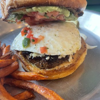 Rodeo Goat - CHACA OAXACA beef & chorizo patty, avocado spread, pico de gallo, fried egg, queso fresco, tabasco mayo. - Burgers Near Me - Houston, Texas Rodeo Goat - CHACA OAXACA beef & chorizo patty, avocado spread, pico de gallo, fried egg, queso fresco, tabasco mayo. - Burgers Near Me - Houston, Texas