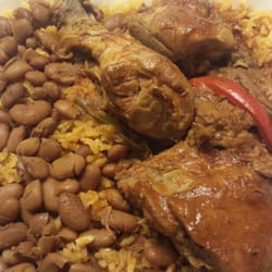 3 Latino Restaurant - Large plate of stew chicken with yellow rice and beans for $8.