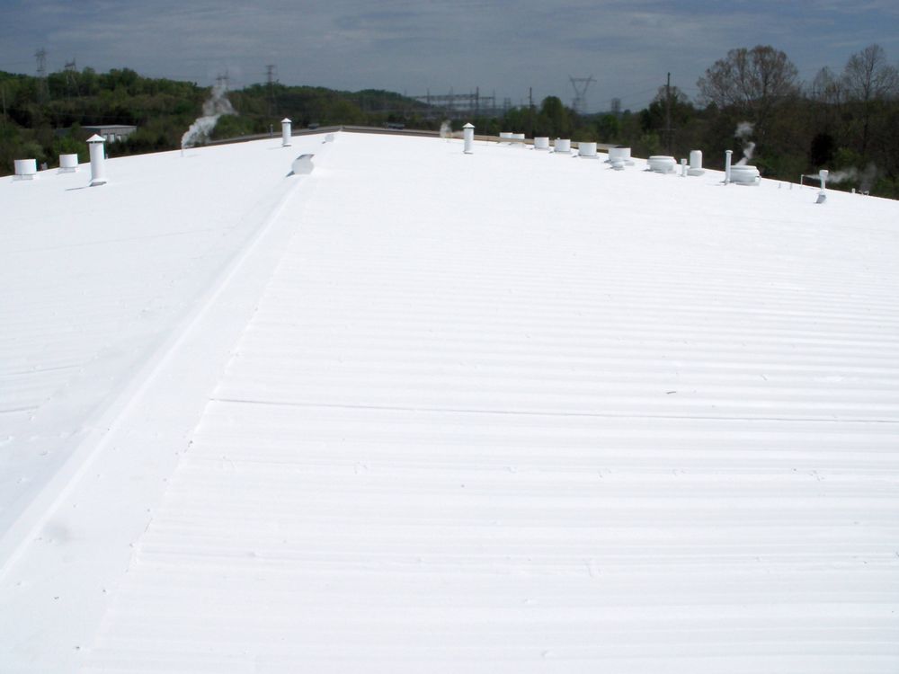Slide of Huntsville Commercial Roofing