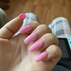 Crystal Nails Salon and Spa - Chipped on the side of middle nail and uneven of the acrylic on pinky nail