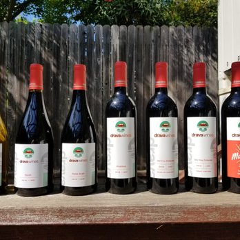 Drava Wines - a row of bottles of wine - Wine Tasting Room Near Me - Lodi, California