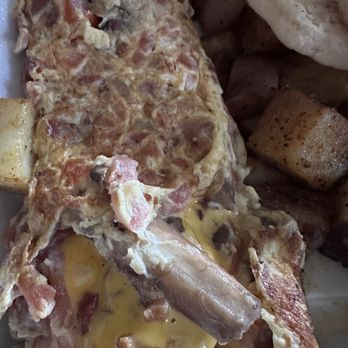 Eggs Up Grill - Pick 3 Omelet - overcooked on the outside & runny on the inside - disgusting - Breakfast & Brunch Near Me - Columbia, South Carolina
